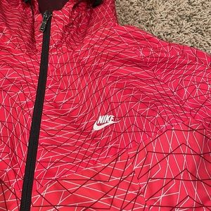Nike Windbreaker, Longer at back, adjustable toggles for hood a s at hem, size L